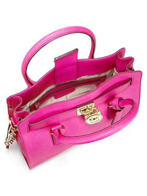 michael kors pink messenger bag|Michael Kors small Messenger bag.